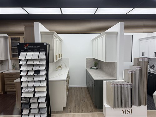 Countertop and tile sample racks on the showroom floor