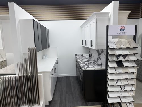 Sample racks beside a dark kitchen display